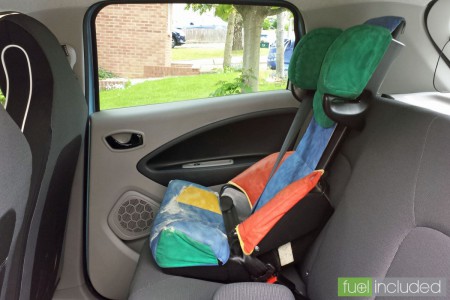 A large child’s car seat fitted in the rear of our Renault ZOE (Image: T. Larkum)