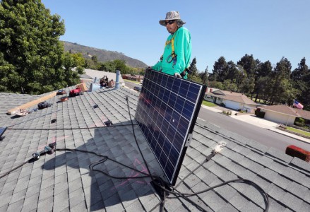 A solar panel being installed at a home in Camarillo, Calif. The state aims to get 50 percent of its energy from renewable sources by 2030. (Image: J.E. Flores/NYT)