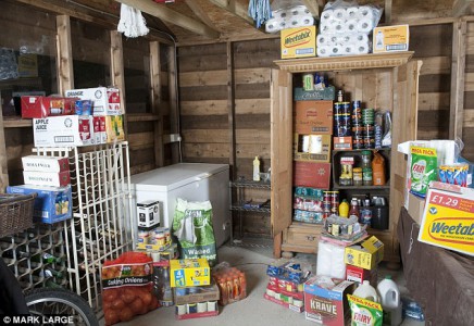 Reserves: The Shaws have enough food and water to last them a year, stored in their garage (Image: M. Large/Daily Mail)